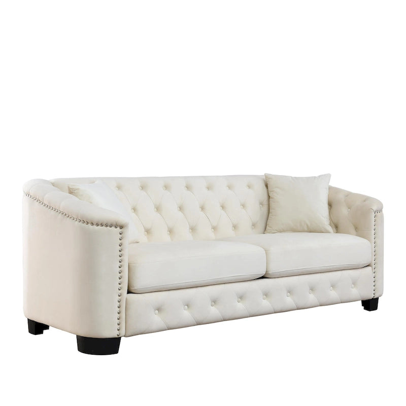 Canapé moderne en velours de 196 cm avec dossier capitonné et accoudoirs ornés de clous décoratifs ; inclut deux coussins décoratifs.