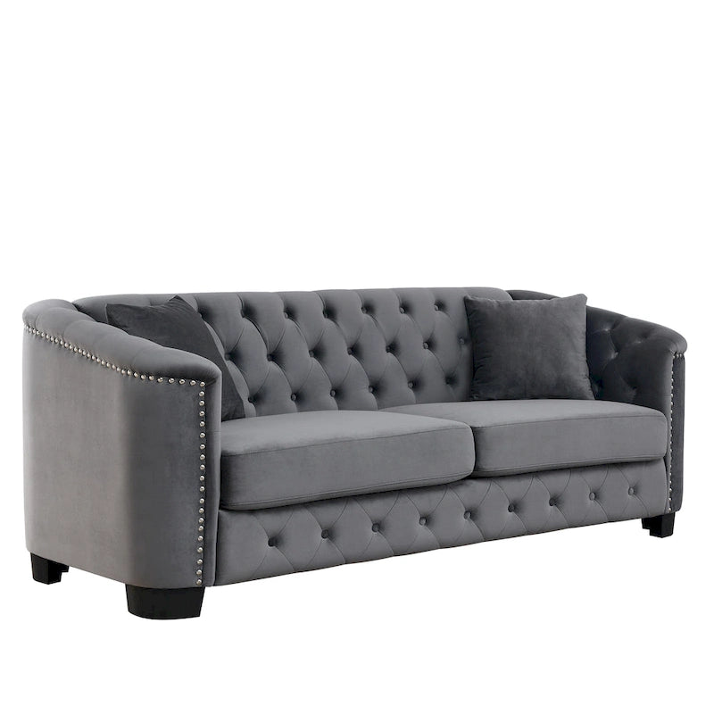 Canapé moderne en velours de 196 cm avec dossier capitonné et accoudoirs ornés de clous décoratifs ; inclut deux coussins décoratifs.