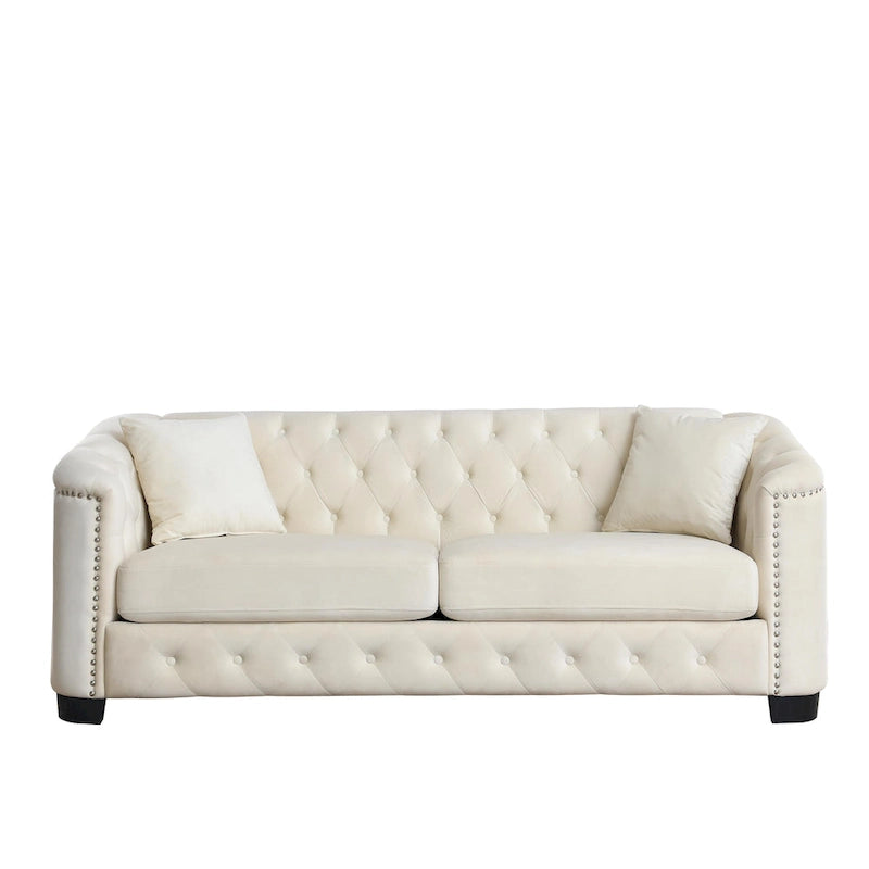 Canapé moderne en velours de 196 cm avec dossier capitonné et accoudoirs ornés de clous décoratifs ; inclut deux coussins décoratifs.