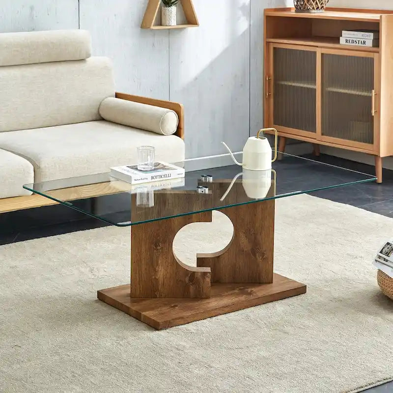A rectangular modern coffee table with tempered glass tabletop and wooden color MDF legs. Suitable for living room.